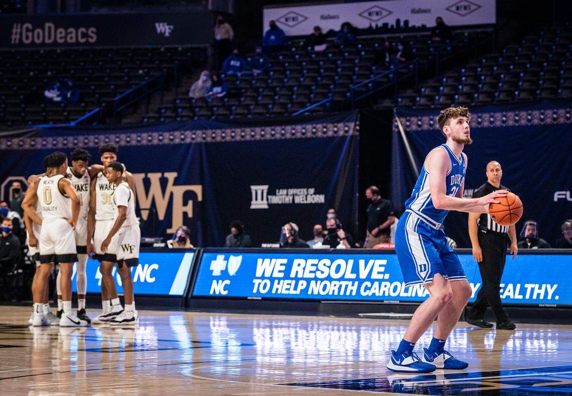Duke forward Matthew Hurt (21) shoots a free throw after Wake Forest head coach Steve Forbes was assessed double technical fouls and thrown out of the game on Wednesday, Feb. 17, 2021 in Winston-Salem, N.C.