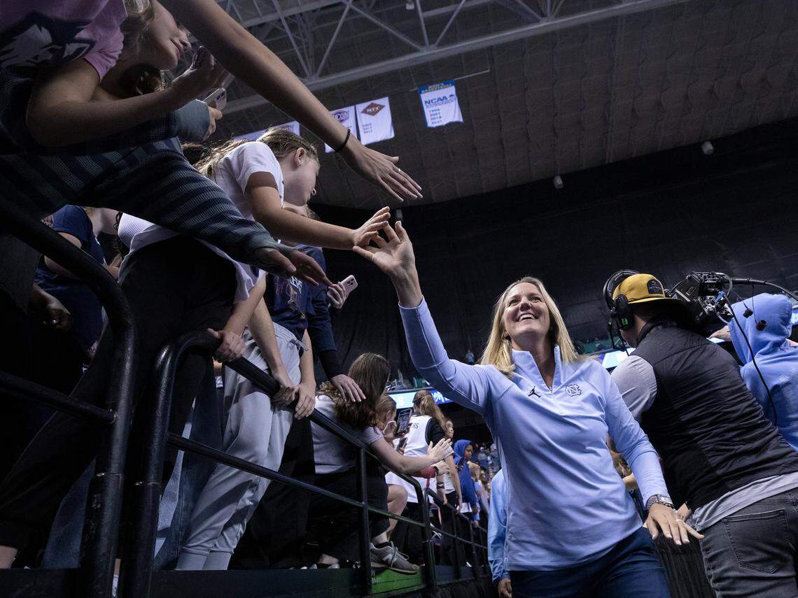 North Carolina head coach Courtney Banghart greets fans prior to the Tar Heels’ game against UConn on Friday, Nov. 15, 2024, at First Horizon Coliseum in Greensboro, N.C.