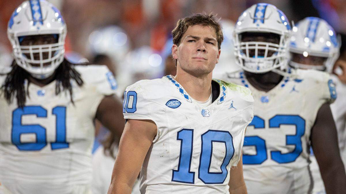 North Carolina quarterback Drake Maye (10) watches a replay of his interception by Clemson’s Nate Wiggins with 2:36 to play in the game to secure a 31-20 victory by the Tigers on Saturday, November 18, 2023 at Memorial Stadium in Clemson, S.C