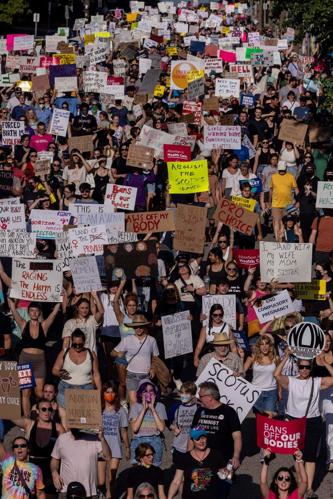 Hundreds of demonstrators rally and march in downtown Raleigh Friday, June, 24, 2022 in opposition to the U.S. Supreme Court’s decision to overturn its landmark Roe v. Wade ruling.