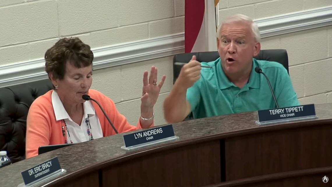 Johnston County school board vice Terry Tippett (right) argues with board member Ronald Johnson (off screen) during Sept. 25, 2023 meeting to hear report on an employee grievance filed against board member Michelle Antoine. Beside Tippett is school board chair Lyn Andrews.