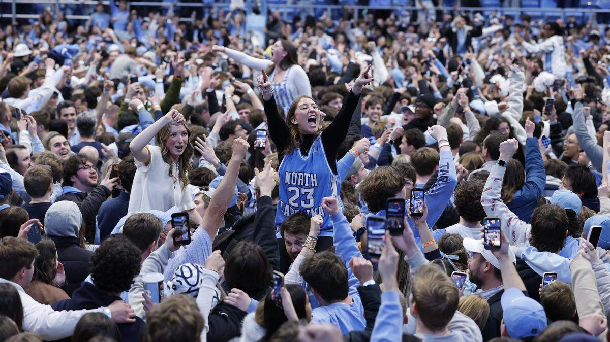 North Carolina fans celebrate after UNC’s 71-68 victory over Duke at the Dean E. Smith Center in Chapel Hill, N.C., Saturday, Feb. 7, 2026.
