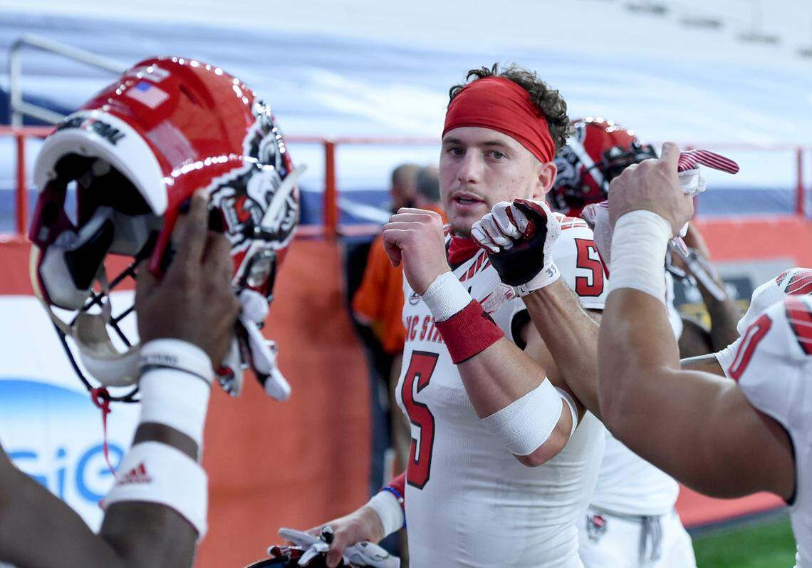 North Carolina State Wolfpack wide receiver Thayer Thomas (5) fist bumps teammates before their game against Syracuse Nov. 28, 2020 at the Carrier Dome in Syracuse New York.