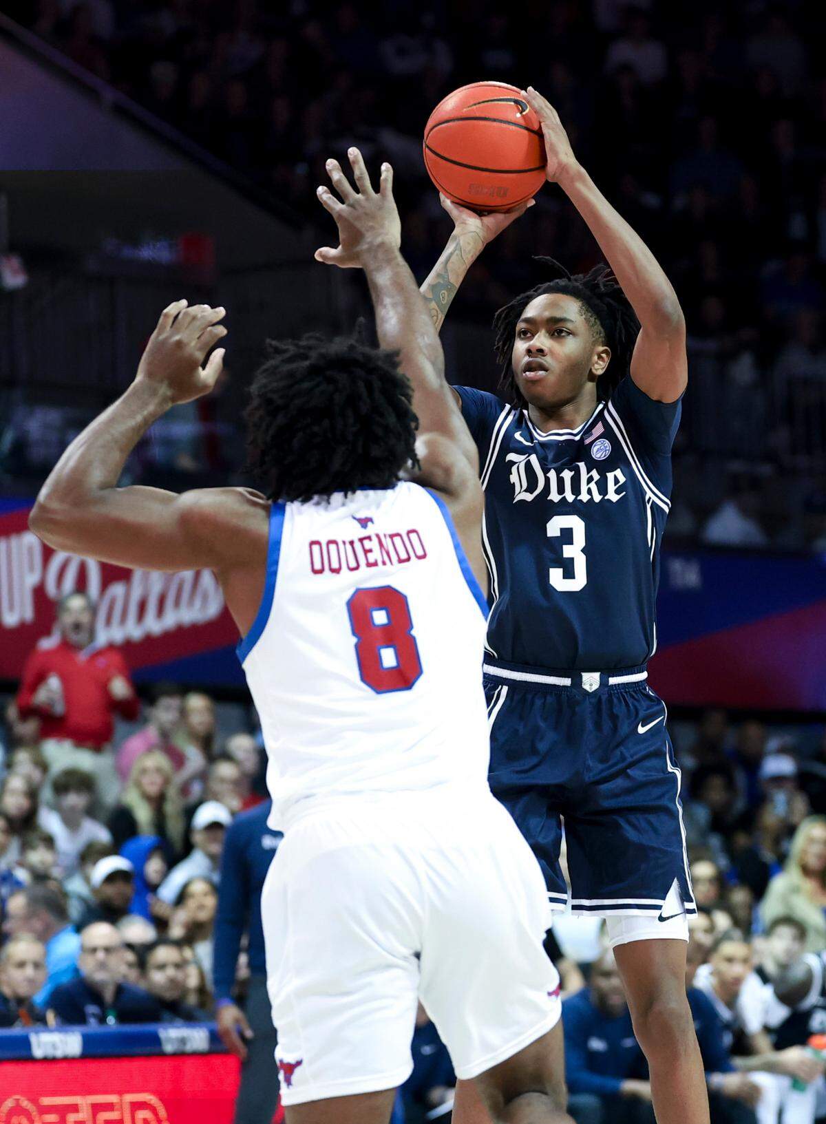 Duke Blue Devils guard Isaiah Evans (3) shoots over Southern Methodist Mustangs guard Kario Oquendo (8) during the first half at Moody Coliseum.