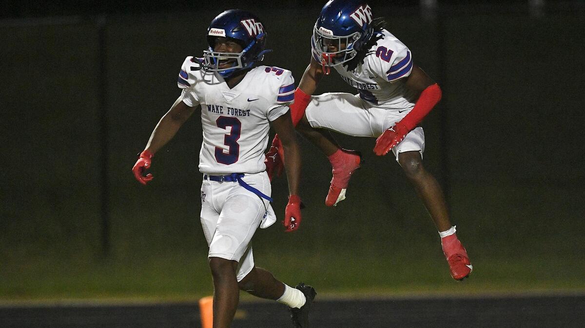 Wake Forest’s Elijah Murdock (2) celebrates Rico Alston’s (3) touchdown during the second halfThe Wake Forest Cougars and the Leesville Road Pride met in a football game in Raleigh, N.C. on September 15, 2023.