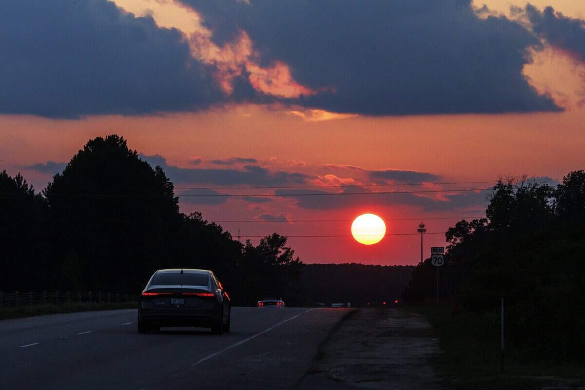 The sun sets over U.S. 70 on Monday, June 29, 2026, in Clayton, North Carolina.
