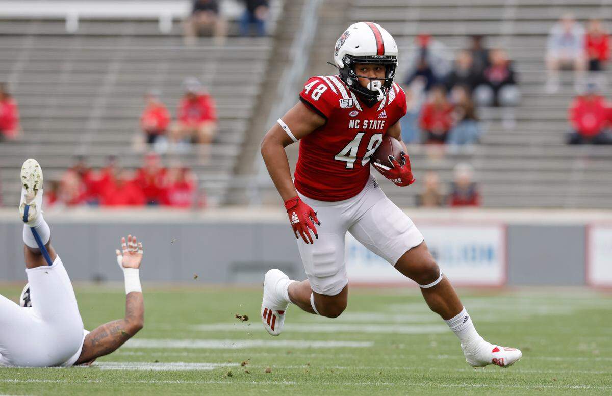 N.C. State tight end Fred Seabrough (48) makes a reception during N.C. State football’s spring game at Carter-Finley Stadium in Raleigh, N.C., Saturday, April 9, 2022.