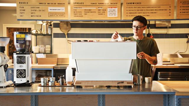 Kaleb Ede, the front of house manager at Benchwarmers, works Wednesday, Feb. 6, 2019, with other employees to prepare for their official opening Feb. 7th at Transfer Co. Food Hall in downtown Raleigh.