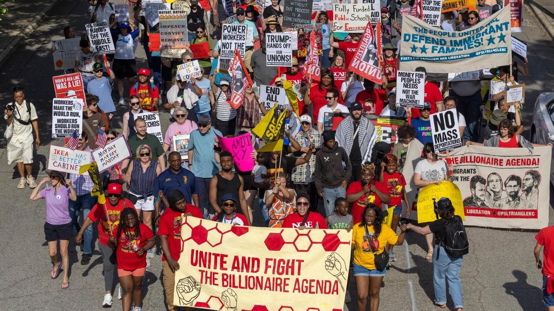 Hundreds of May Day demonstrators march along Lane Street from the Halifax Mall to the Bicentennial Mall on Thursday, May 1, 2025 in Raleigh, N.C.