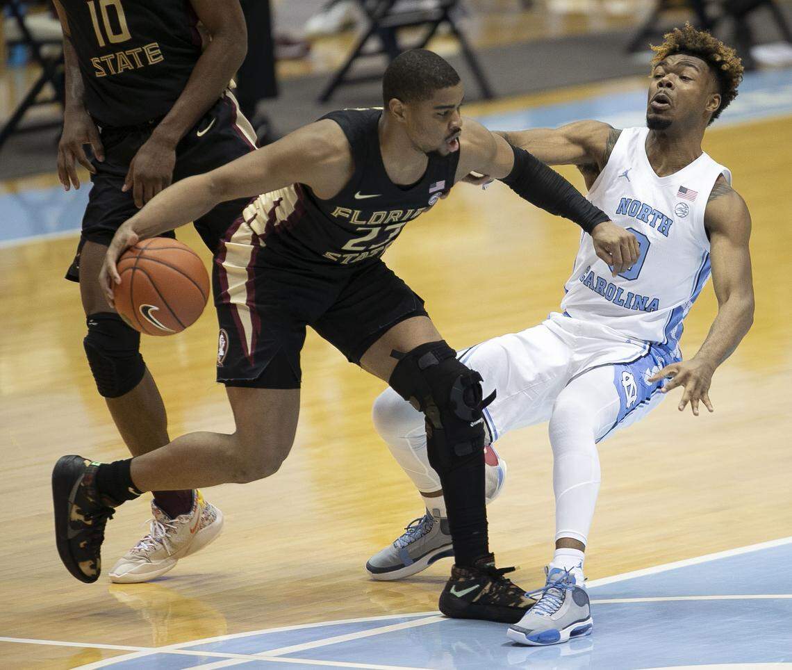 Florida State’s M.J. Waller (23) drives against North Carolina’s Anthony Harris (0) during the second half on Saturday, February 27, 2021 in Chapel Hill, N.C.