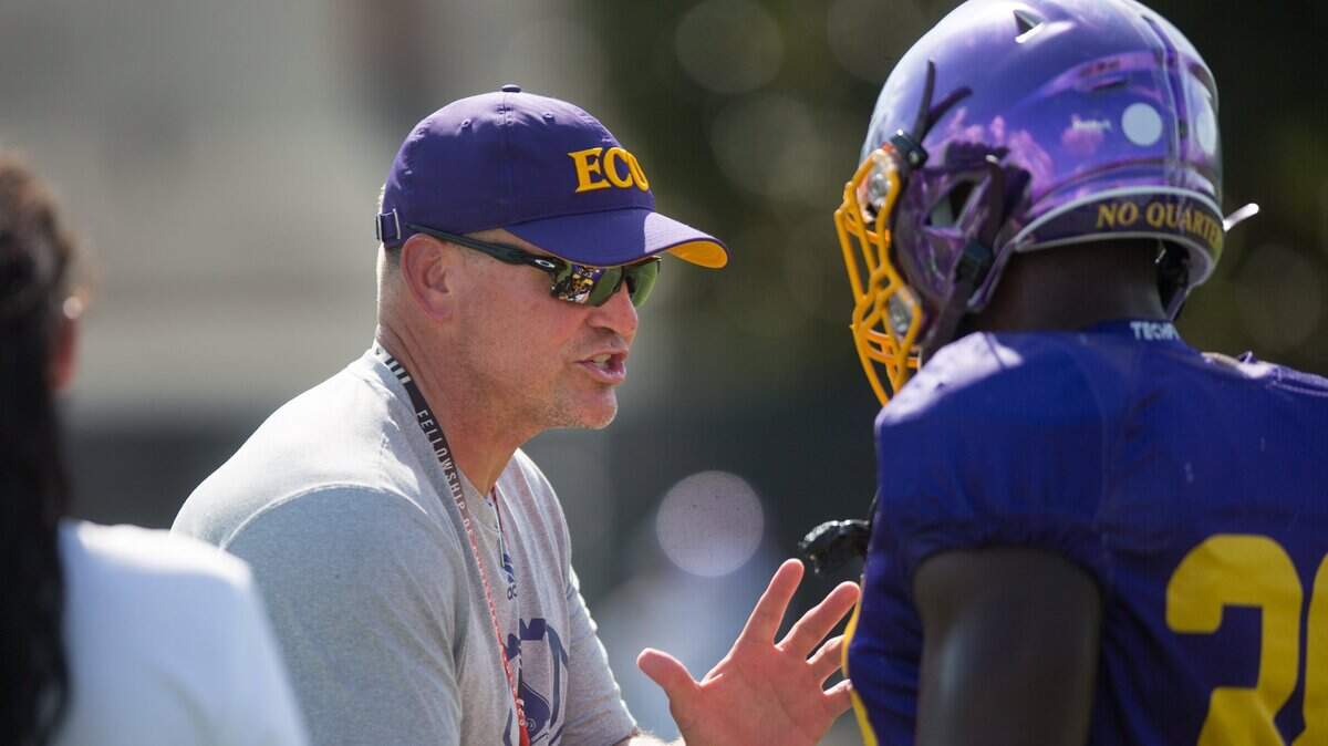 East Carolina head football coach Mike Houston signed 25 players during early National Signing Day on Wednesday.