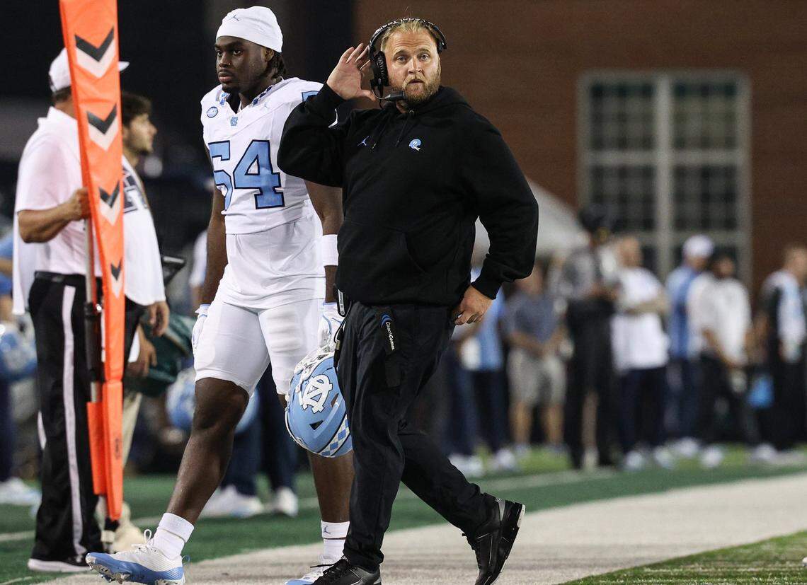 Chapel Hill defensive coordinator Steve Belichick walks back to the sideline after a timeout during the game againt UNC-Charlotte at Jerry Richardson Stadium in Charlotte on Saturday, September 6, 2025.