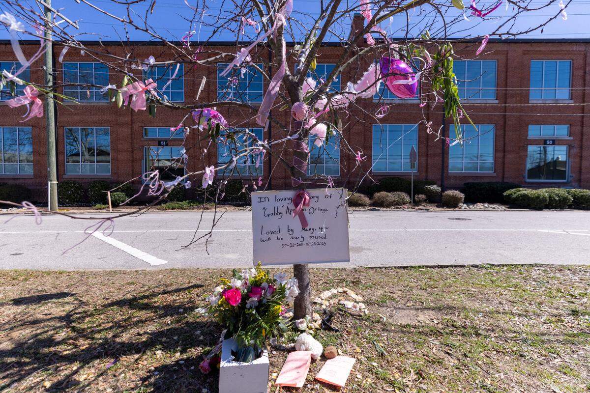 A makeshift memorial for 13-year-old Gabriela Ortega stands outside Durham School of the Arts on Tuesday, March 11, 2025. The eighth grader died by suicide last month, according to her family.