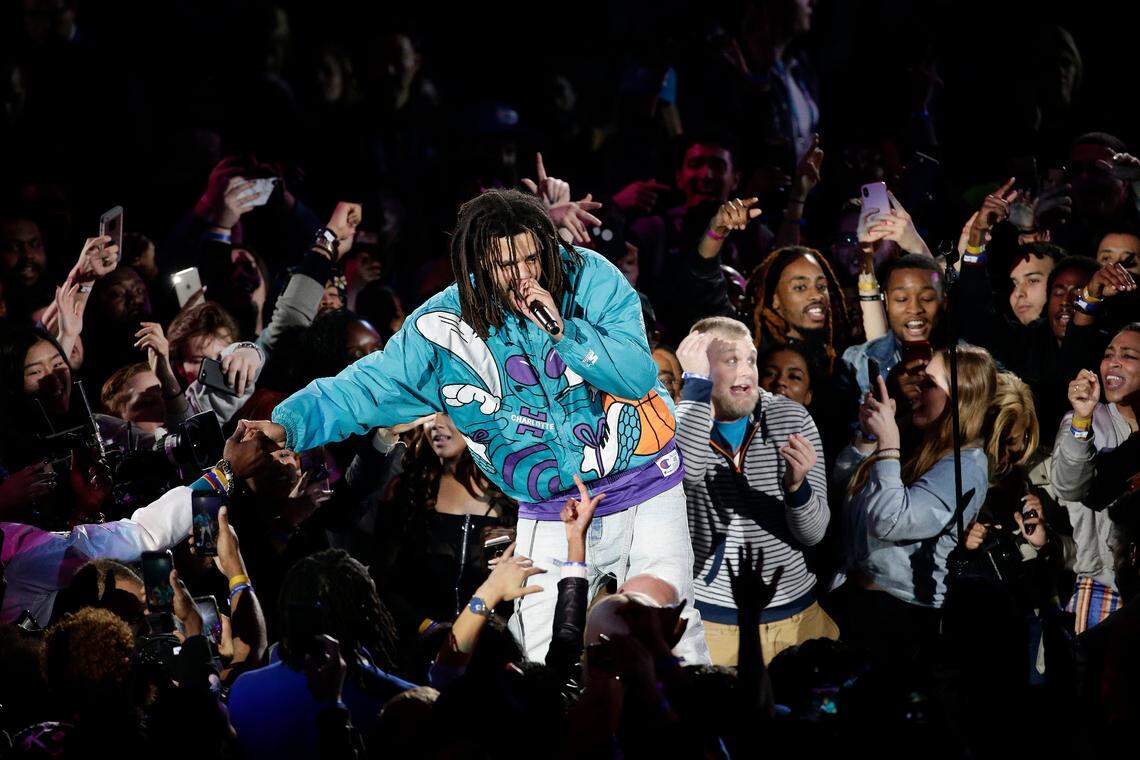 Rapper J. Cole performs at halftime during NBA All-Star basketball game, Sunday, Feb. 17, 2019, in Charlotte, N.C.