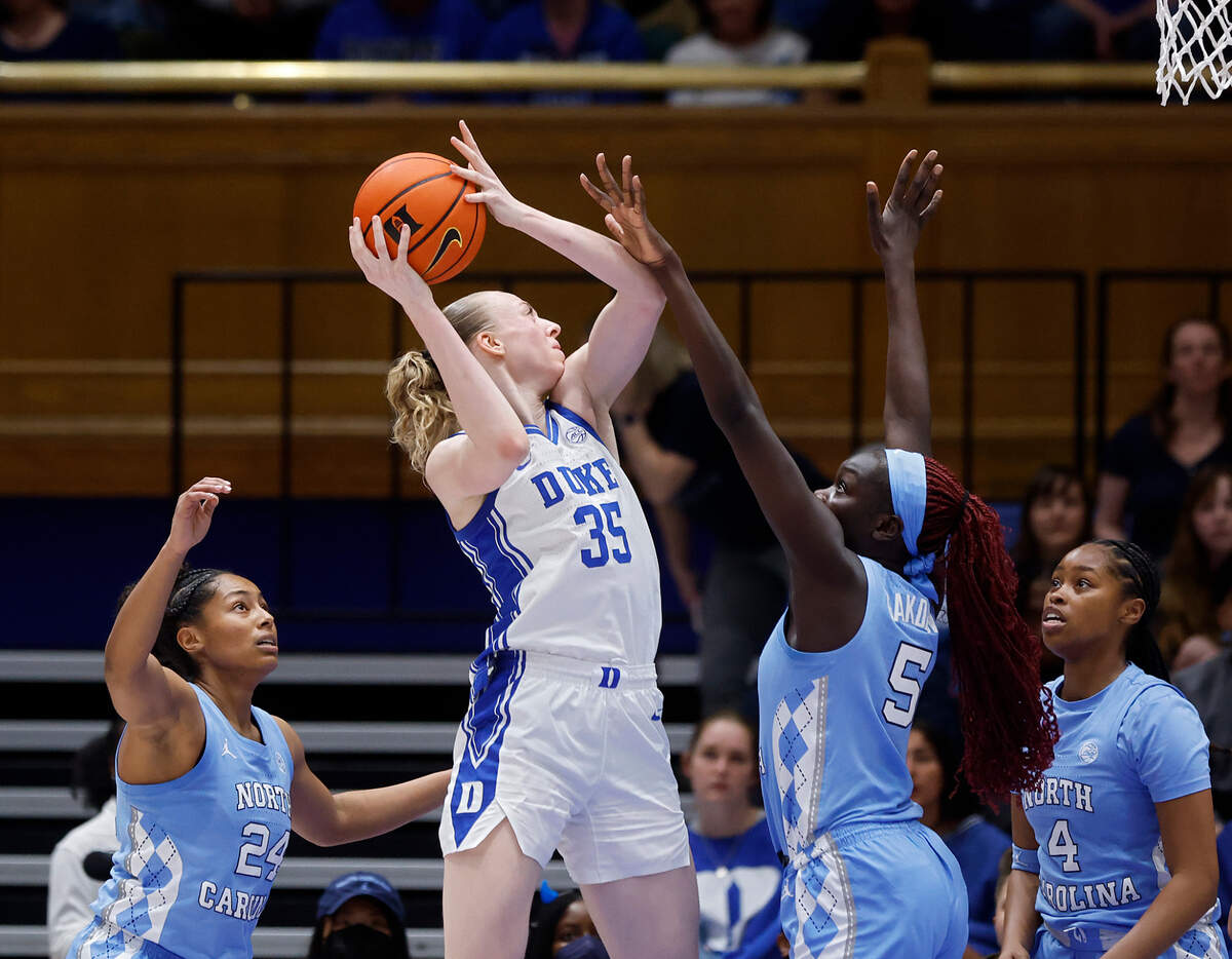 Duke’s Toby Fournier works against North Carolina’s Maria Gakdeng during the first half of the Blue Devils’ 68-53 win on Sunday, Feb. 23, 2025, at Reynolds Coliseum in Raleigh, N.C.