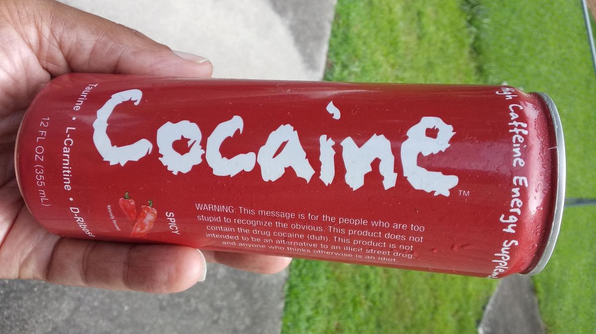Minister Paul Scott purchased a can of Cocaine Energy to show community members what’s being sold in local stores.