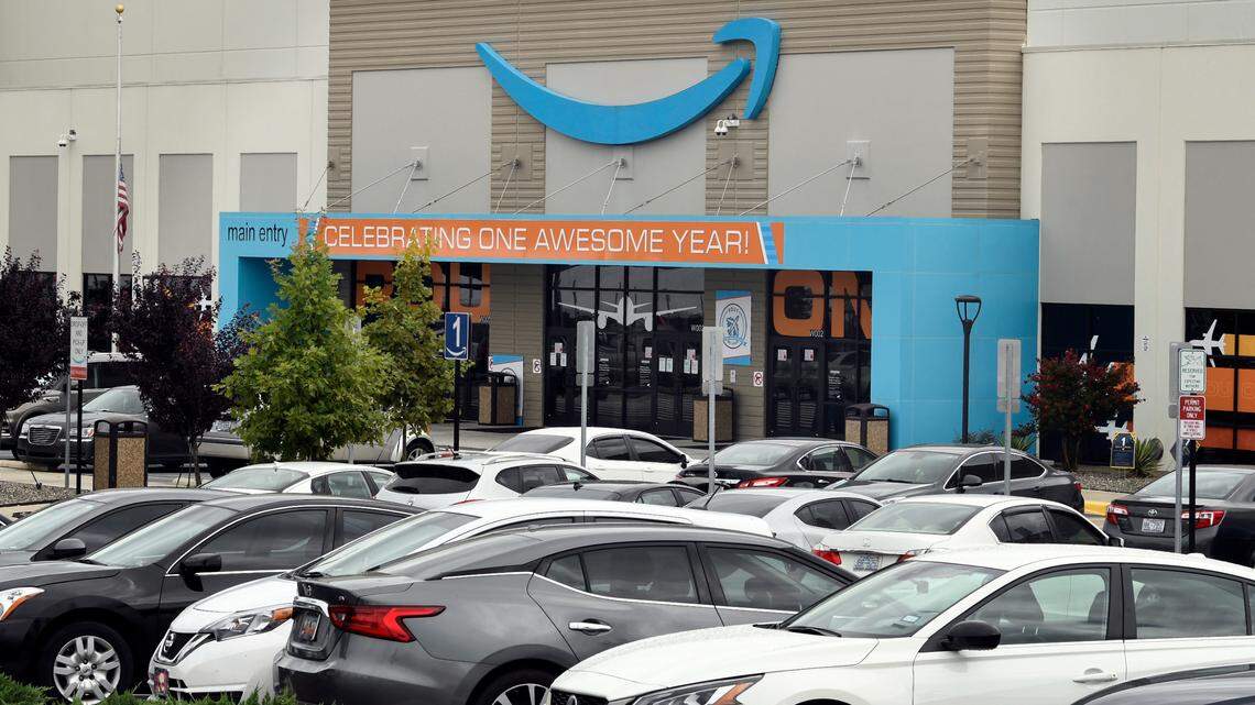Amazon has informed warehouse workers that they will be required to wear a mask inside operations facilities, including this large operation in Garner, N.C., regardless of their vaccination status.