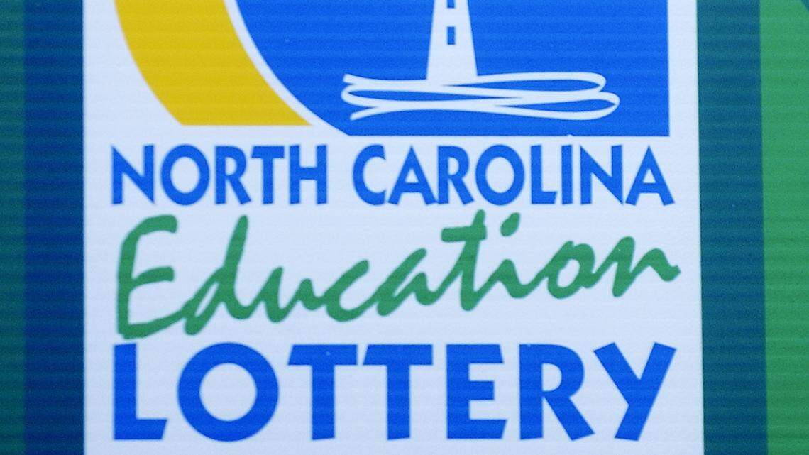 “I’m still shaking. I’ve never had a check with that much money,” she said. (AP Photo/Sara D. Davis)