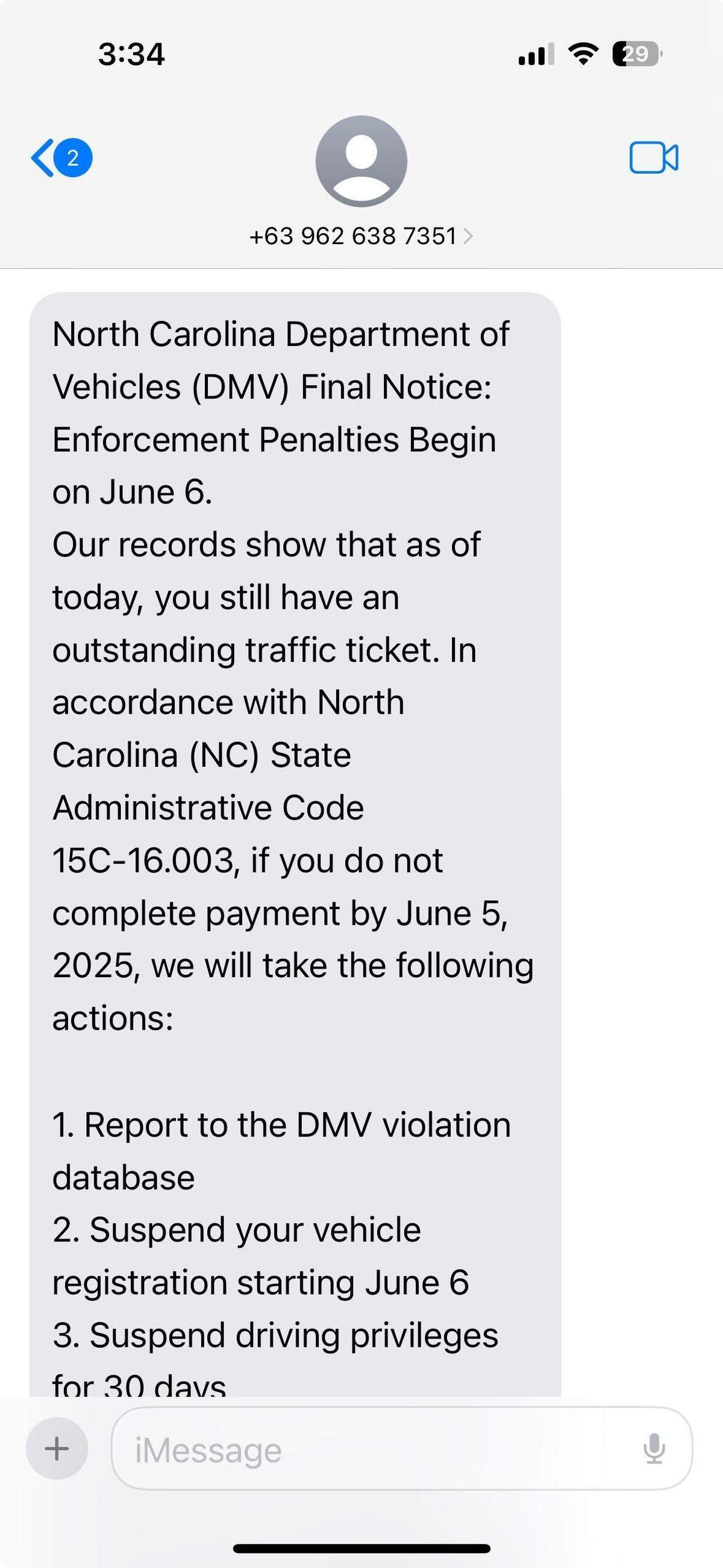 The top of a scam text message, purportedly from the N.C. DMV, telling people they owe money.