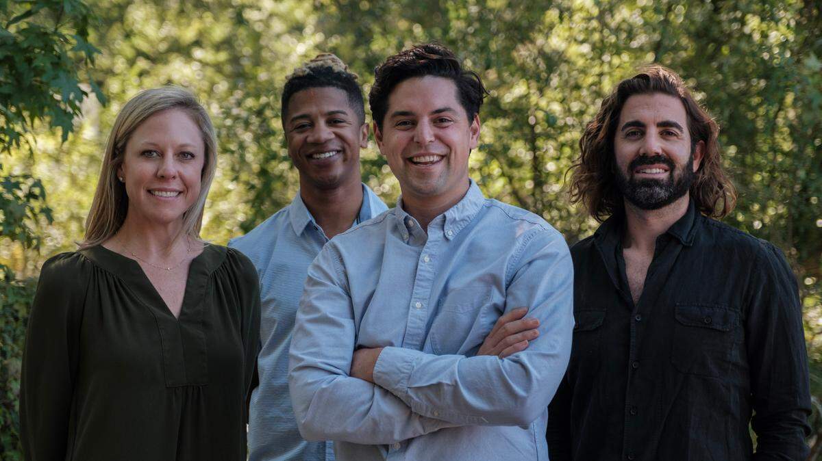 Alex Lassiter, second from right, founded Green Places to help more companies attempt to go carbon neutral.