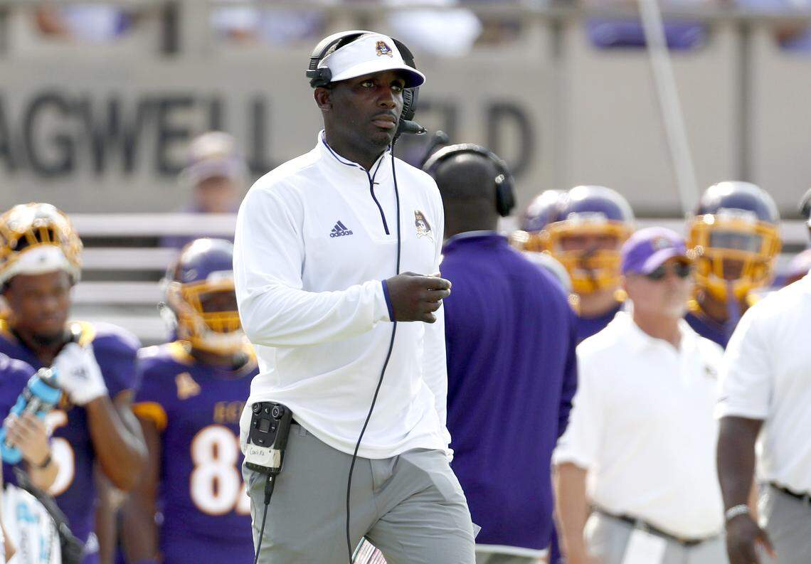 East Carolina coach Scottie Montgomery walks the sidelines during the Pirates’ 41-19 victory over North Carolina on Saturday, September 8, 2018 at Dowdy-Ficklen Stadium in Greenville, N.C.