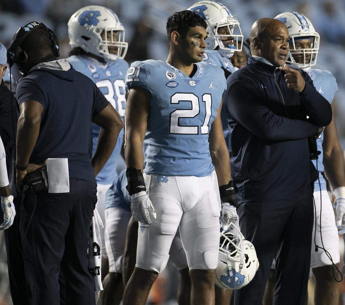 Originally a quarterback at UNC, Chazz Surratt (21) played linebacker his final two seasons.
