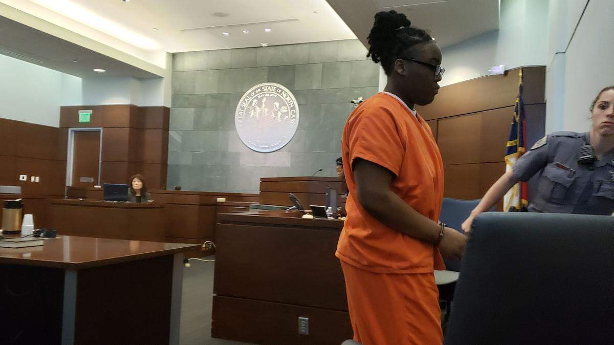 Alexis Joyner, left, after a hearing in a Durham County courtroom on Wednesday, July 24, 2019.