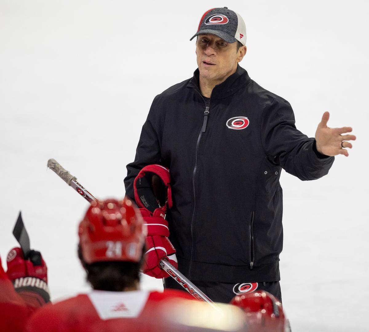 Carolina Hurricanes coach Rod Brind’Amour talks to center Seth Jarvis (24) during practice on Thursday, May 2, 2024 at PNC Arena in Raleigh, N.C.