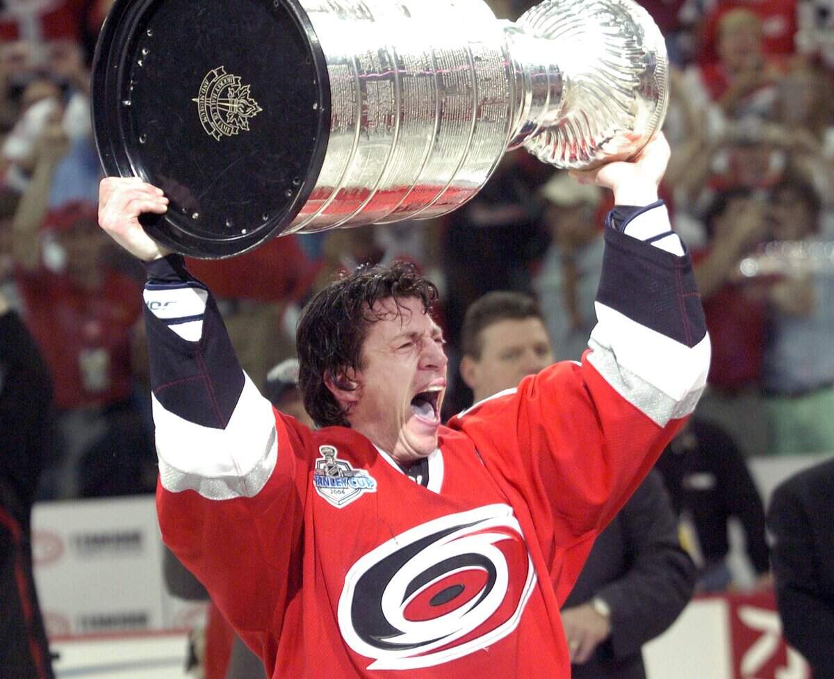 The Canes Rod Brind’Amour hoists the Stanley Cup after the Hurricanes beat the Edmonton Oilers in Game 7 in 2006.