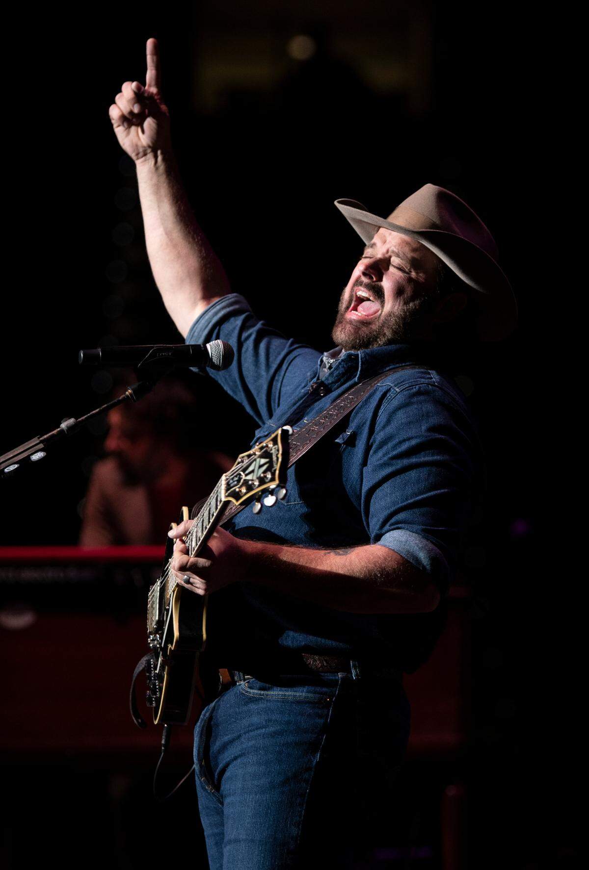 Randy Houser opens for Cody Johnson in concert at Raleigh, N.C.’s PNC Arena, Saturday night, Jan. 28, 2023.