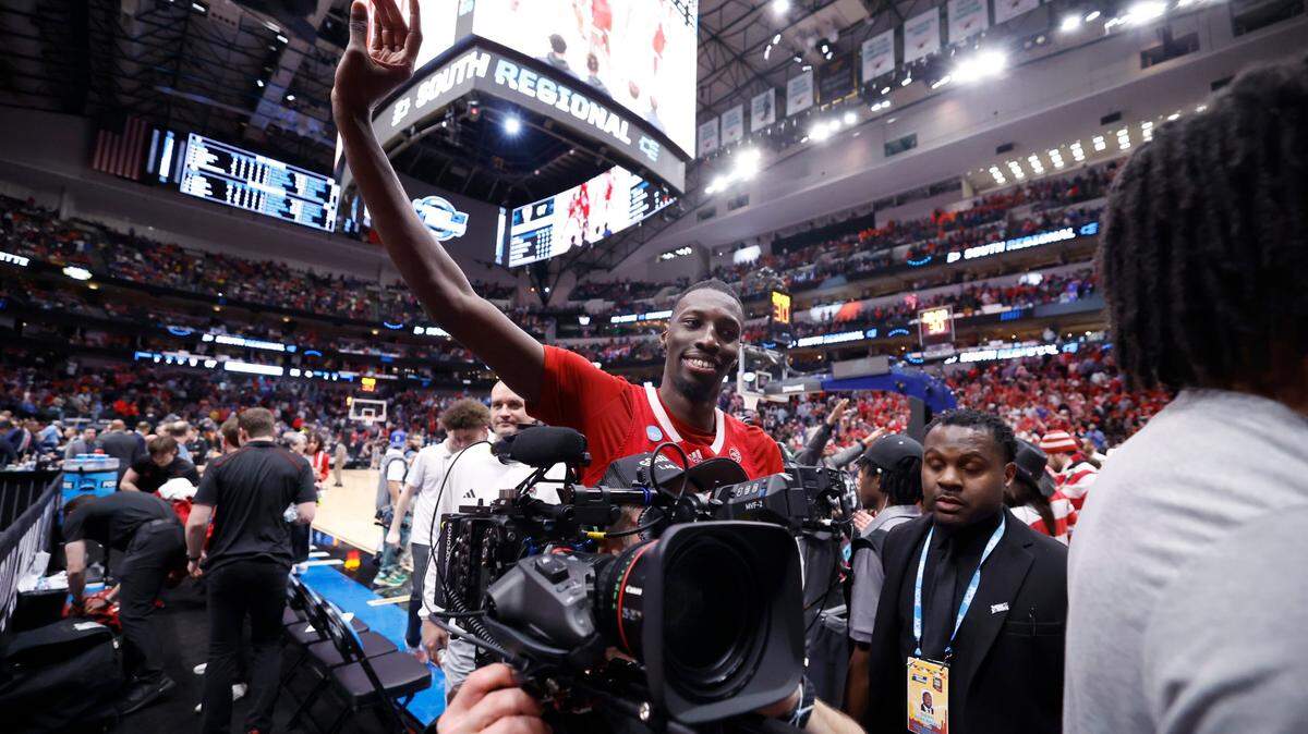 N.C. State’s Mohamed Diarra (23) celebrates as he comes off the court after N.C. State’s 67-58 victory over Marquette in their NCAA Tournament Sweet 16 game at the American Airlines Center in Dallas, Texas, Friday, March 29, 2024.