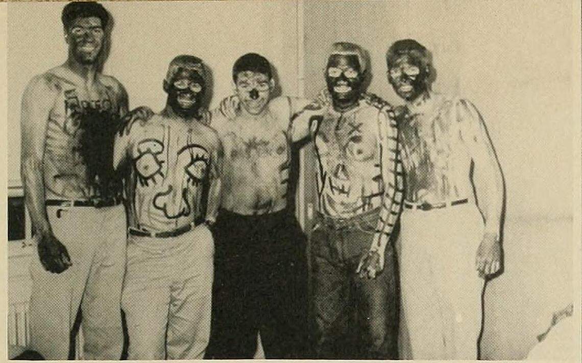 A photo on the Sigma Phi Beta fraternityÕs page in a 1957 Elon University yearbook. The image was one of two images with students wearing paint on their face in a recent Elon review of its yearbook.