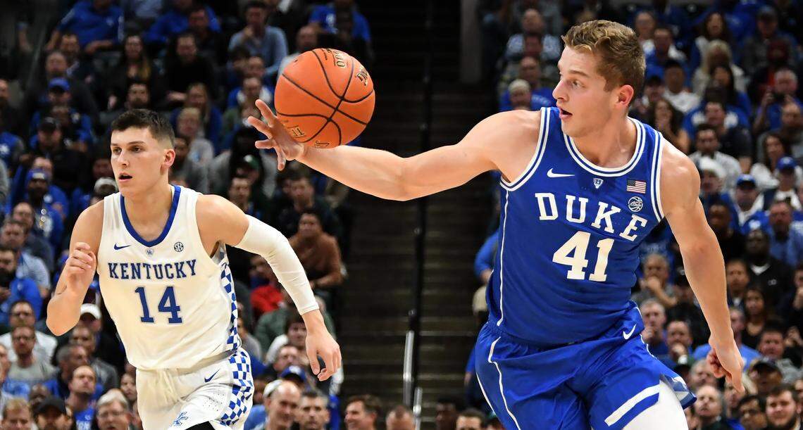 Duke forward Jack White (41) grabs a loose ball in the second half of play as Kentucky guard Tyler Herro (14). Duke defeated Kentucky 118-84 in the Champions Classic at the Bankers Life Fieldhouse in Indianapolis, Indiana, Tuesday, Nov. 6, 2018.