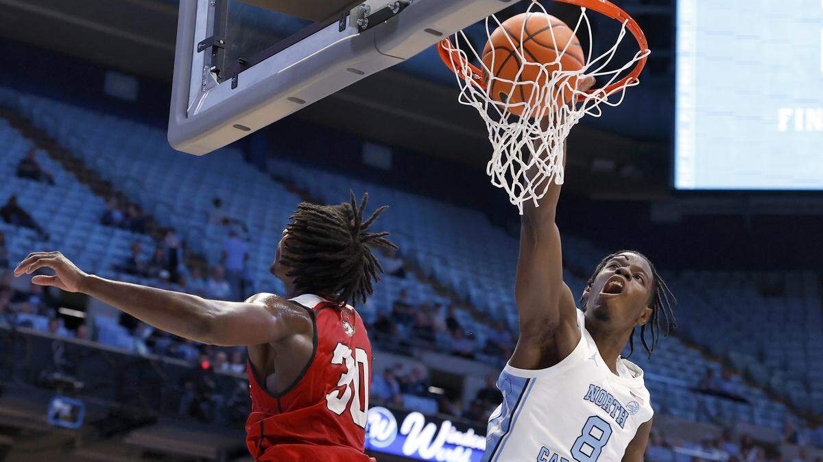 North Carolina’s Caleb Wilson dunks over Winston-Salem State’s Abou Camara during the first half of the Tar Heels’ exhibition game on Wednesday, Oct. 29, 2025, at the Smith Center in Chapel Hill, N.C.