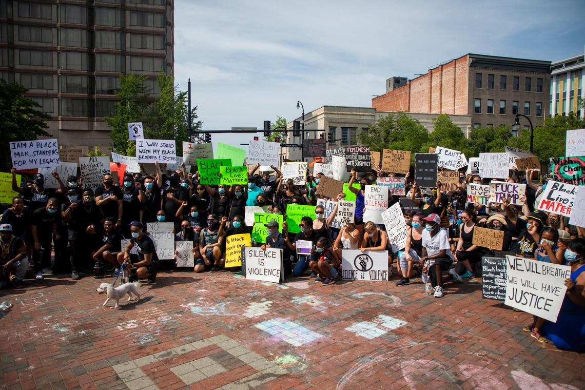 A group of protesters, organized by two 13-year-old friends, Beautiful Green, a ninth-grader, and Morgan Johnson, an eighth-grader, gathers for a group photo after marching through downtown Durham, N.C., in response to the death of George Floyd and others, on Saturday, Jun. 6, 2020.