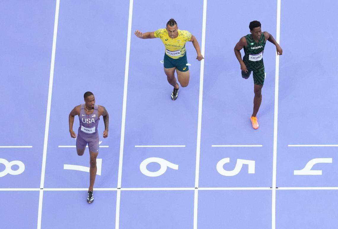 Aug 4, 2024; Paris, FRANCE; Quincy Hall (USA) wins a men’s 400m round 1 heat during the Paris 2024 Olympic Summer Games at Stade de France.
