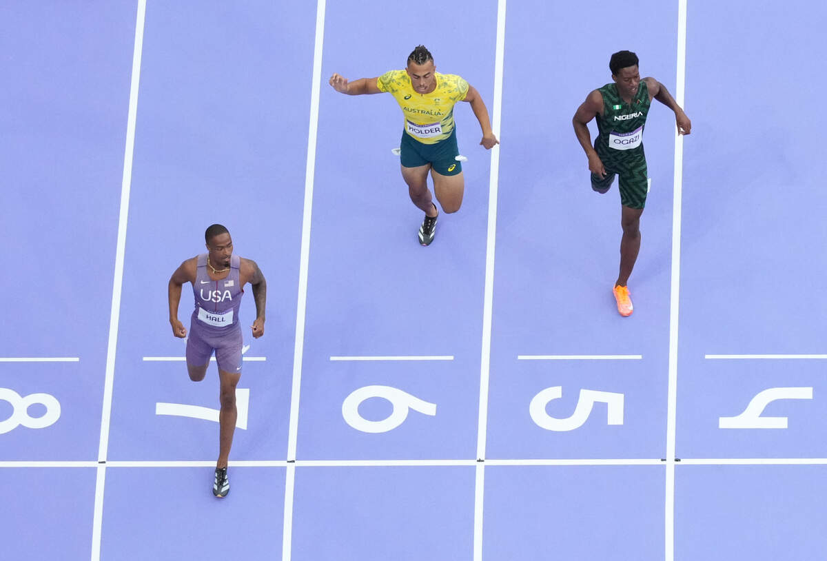 Aug 4, 2024; Paris, FRANCE; Quincy Hall (USA) wins a men’s 400m round 1 heat during the Paris 2024 Olympic Summer Games at Stade de France.