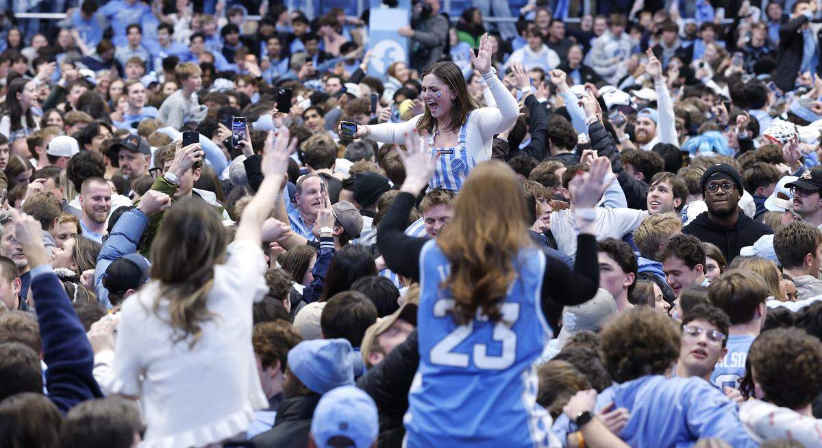 North Carolina fans celebrate after UNC’s 71-68 victory over Duke at the Dean E. Smith Center in Chapel Hill, N.C., Saturday, Feb. 7, 2026.