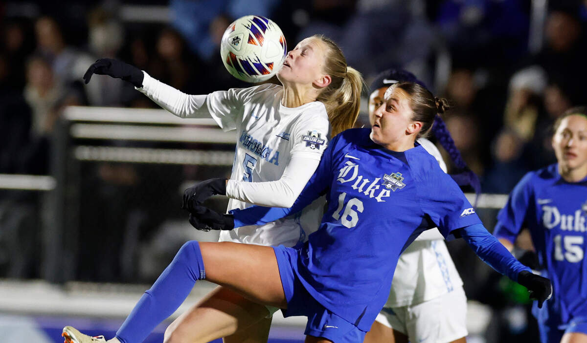 Duke’s Carina Lageyre (16) battles North Carolina’s Maddie Dahlien (5) for the ball during the first half of UNC’s game against Duke in the semifinals of the 2024 Women’s College Cup at WakeMed Soccer Park in Cary, N.C., Friday, Dec. 6, 2024.