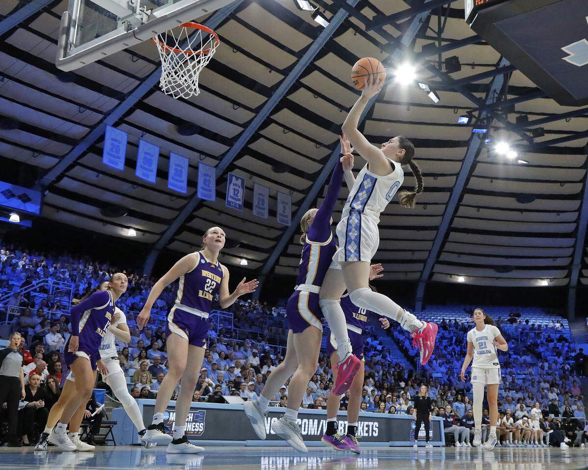 North Carolina’s Lanie Grant shoots over Western Illinois’ Kaylen Reed during the first half of the Tar Heels’ 82-51 first-round NCAA Tournament win on Friday, March 20, 2026, at Carmichael Arena in Chapel Hill, N.C.