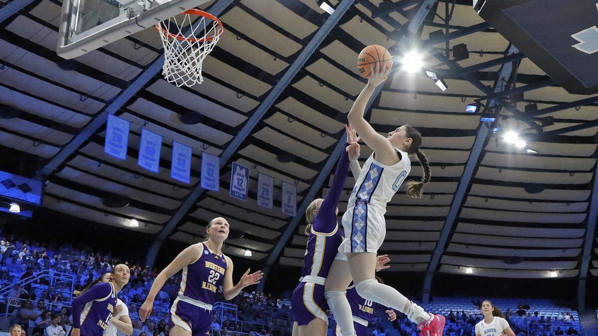 North Carolina’s Lanie Grant shoots over Western Illinois’ Kaylen Reed during the first half of the Tar Heels’ 82-51 first-round NCAA Tournament win on Friday, March 20, 2026, at Carmichael Arena in Chapel Hill, N.C.