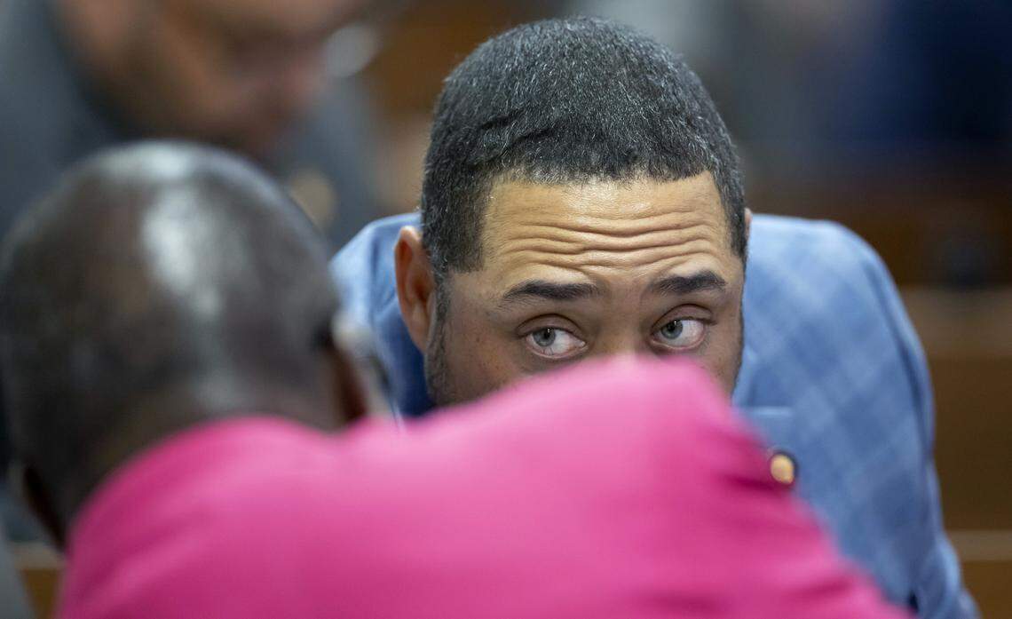 Rep. B. Ray Jeffers, who represents Durham and Person counties talks with Rep. James Roberson of Wake County during debate of HB 696, before its passage in the House on Wednesday, April 22, 2026 in Raleigh, N.C.