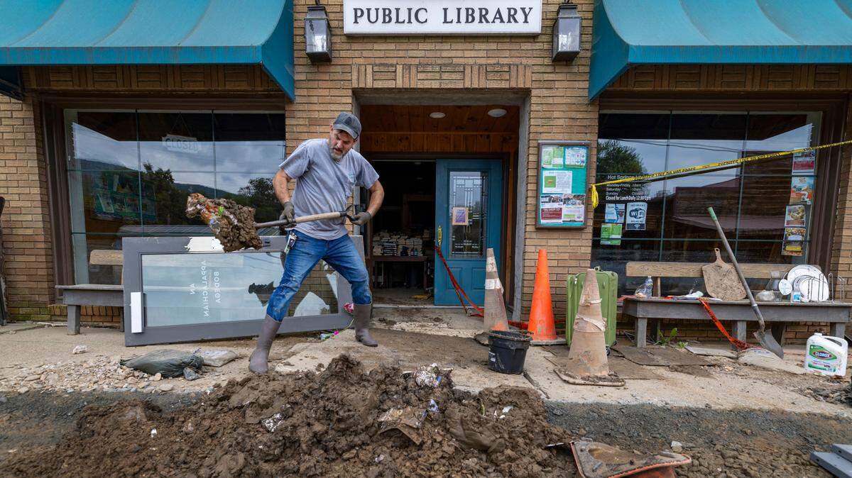 Photos: Volunteers take on the task of recovery in flooded NC mountain town