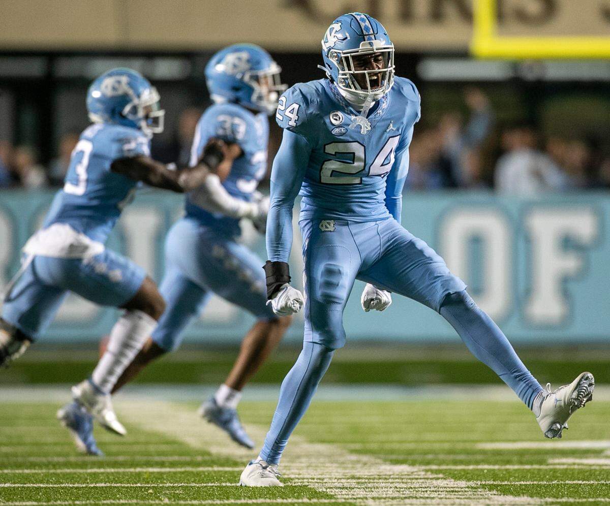 North Carolina’s Malaki Hamrick (24) reacts after teammate Cedric Grey forced a fumble by Pitt’s Israel Abanikanda and recovered the ball in the fourth quarter on Saturday, October 29, 2022 at Kenan Stadium in Chapel Hill, N.C.