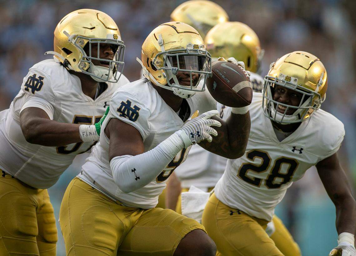Notre Dame’s Justin Ademilola (9) reacts after recovering a fumble by North Carolina quarterback Drake Maye in the third quarter on Saturday, September 24, 2022 at Kenan Stadium in Chapel Hill, N.C.
