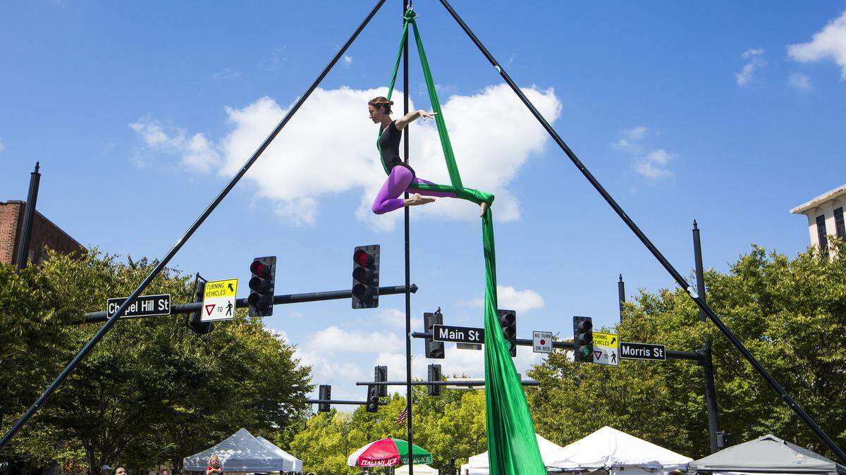 Aerialist Katie King, of the Durham Ballet Theater, performs during the 43rd annual CenterFest Arts Festival at the 5 Points Stage on Sunday, Sept. 17, 2017, in Durham, NC.