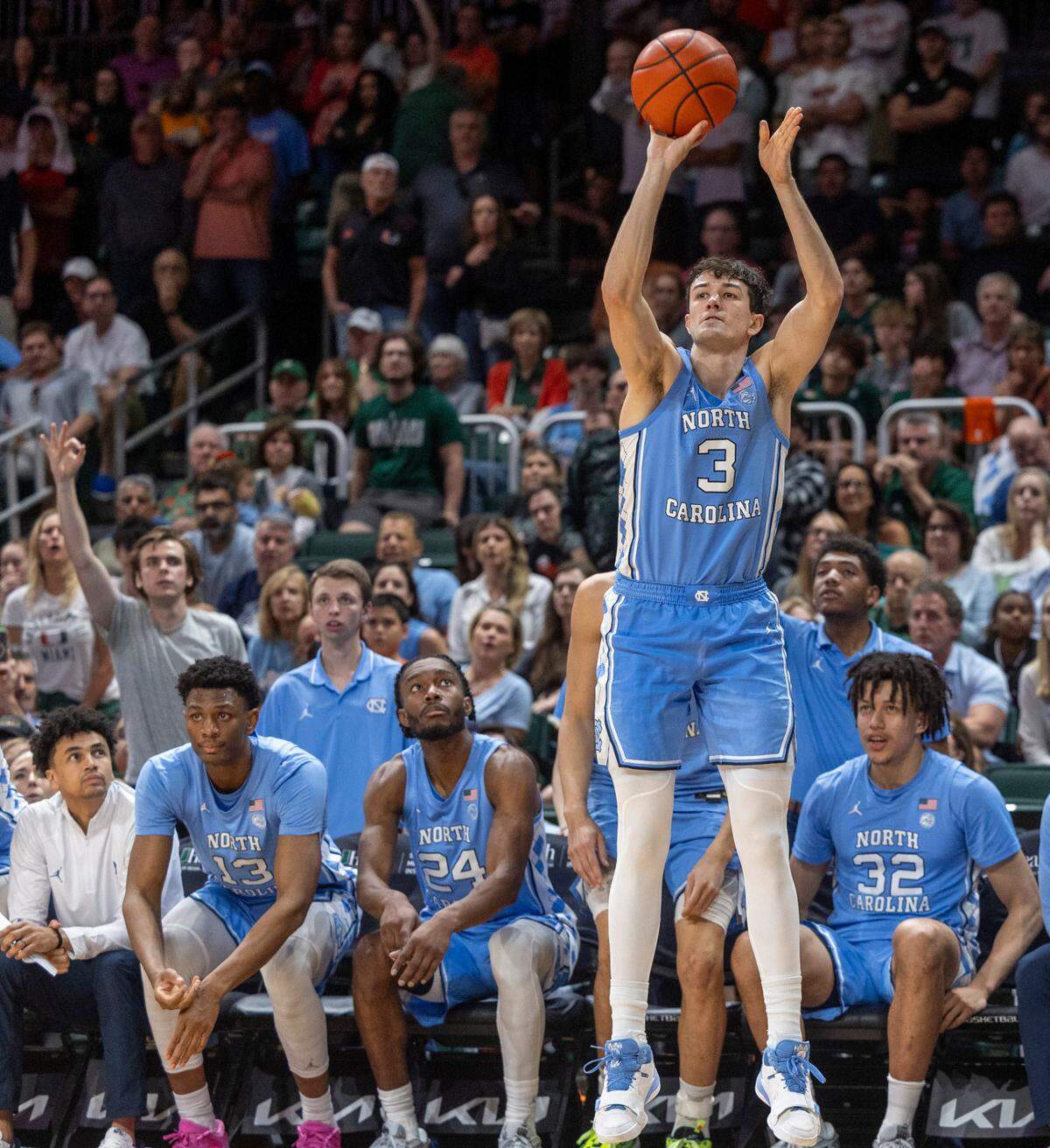North Carolina’s Cormac Ryan (3) launches a three point shot in the second half against Miami on Saturday, February 10, 2024 at the Watsco Center in Coral Gables, Florida.