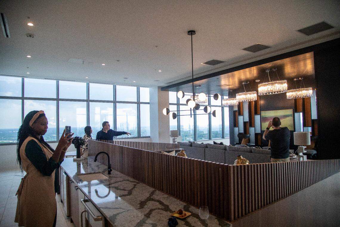 Potential renters tour Kane Realty’s 36-story luxury apartment tower off Six Forks Road called the Eastern Residences at North Hills in Raleigh Friday, May 6, 2022.