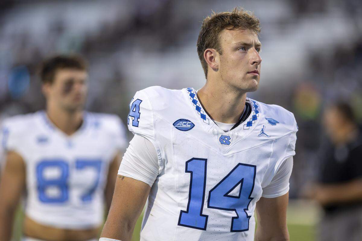 North Carolina quarterback Max Johnson (14) leaves the field following the Tar Heels’ 34-9 loss to the University of Central Florida on Saturday, September 20, 2025 at Acrisure Bounce House Stadium in Orlando, Fla.