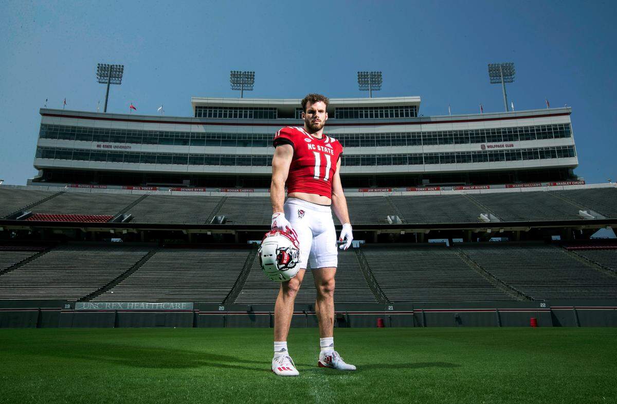 N.C. State’s Payton Wilson poses at Carter-Finley Stadium in Raleigh, N.C., Thursday, July 29, 2021.